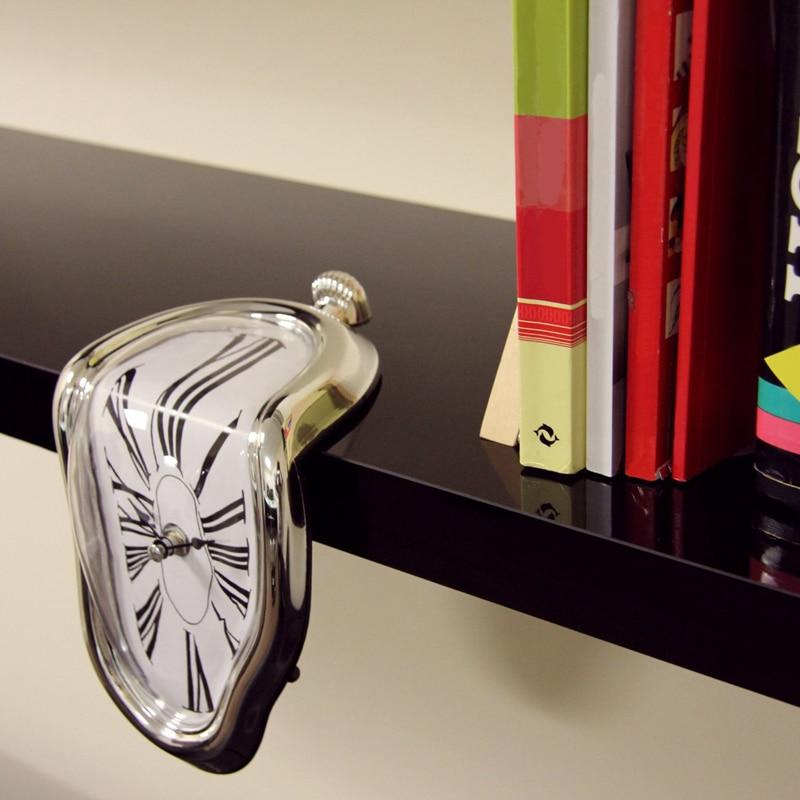 Salvador Dali distorted decorative clock on black shelf