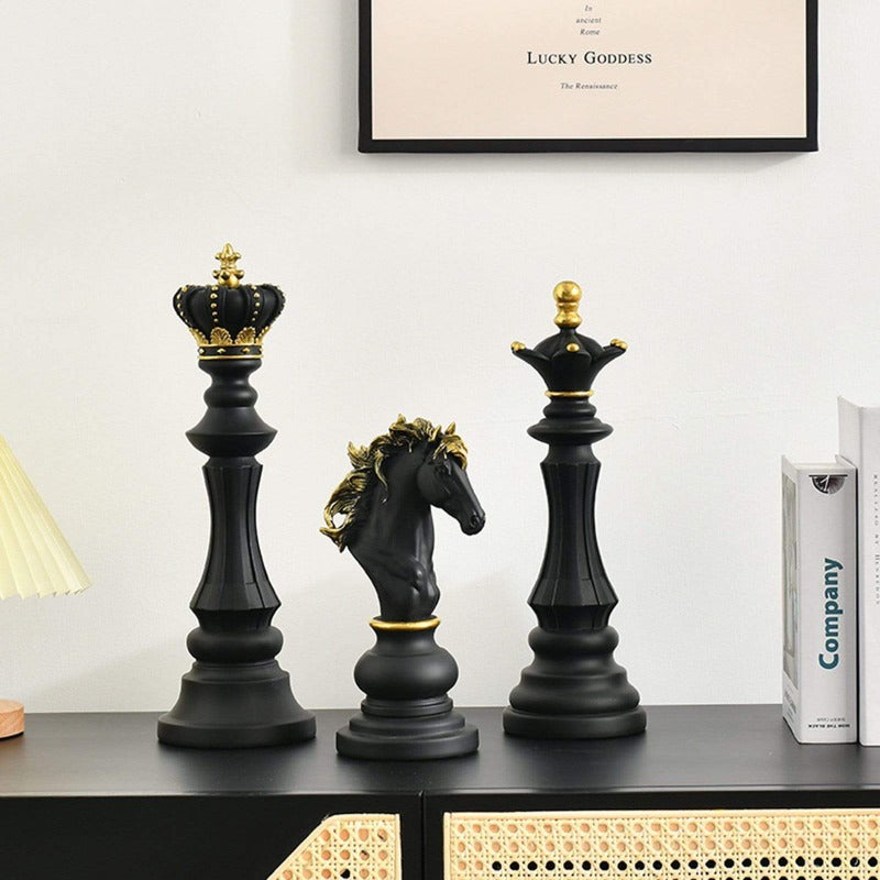 Black decorative chess set on black end table